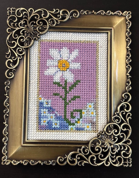 naive cross stitch daisy.  Birth Flower of the month  April. 