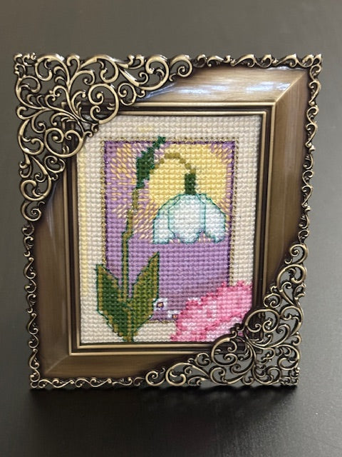 Cross stitch inspired by snowdrops and carnations